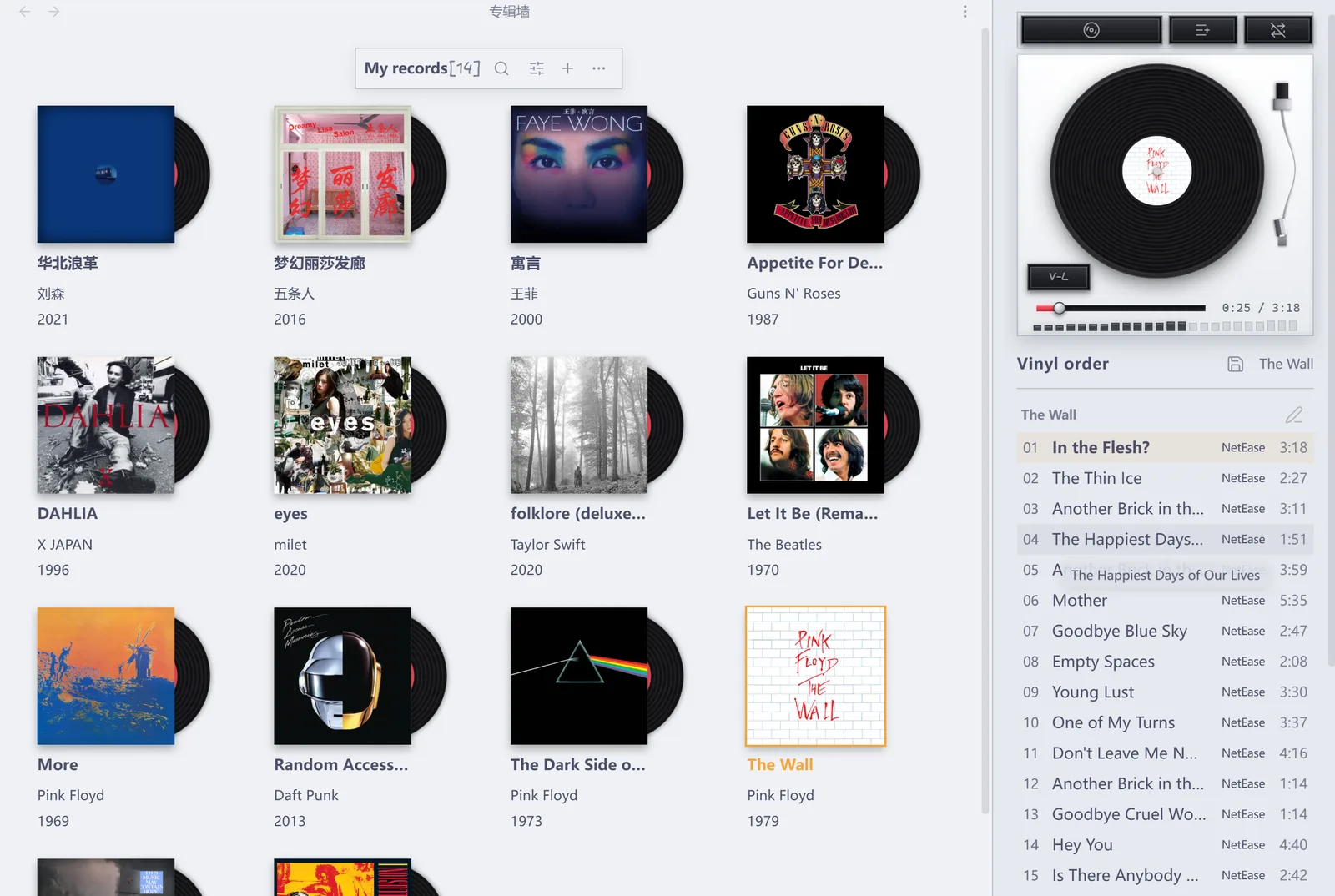 The album shelf: cover cards and the turntable player in the sidebar