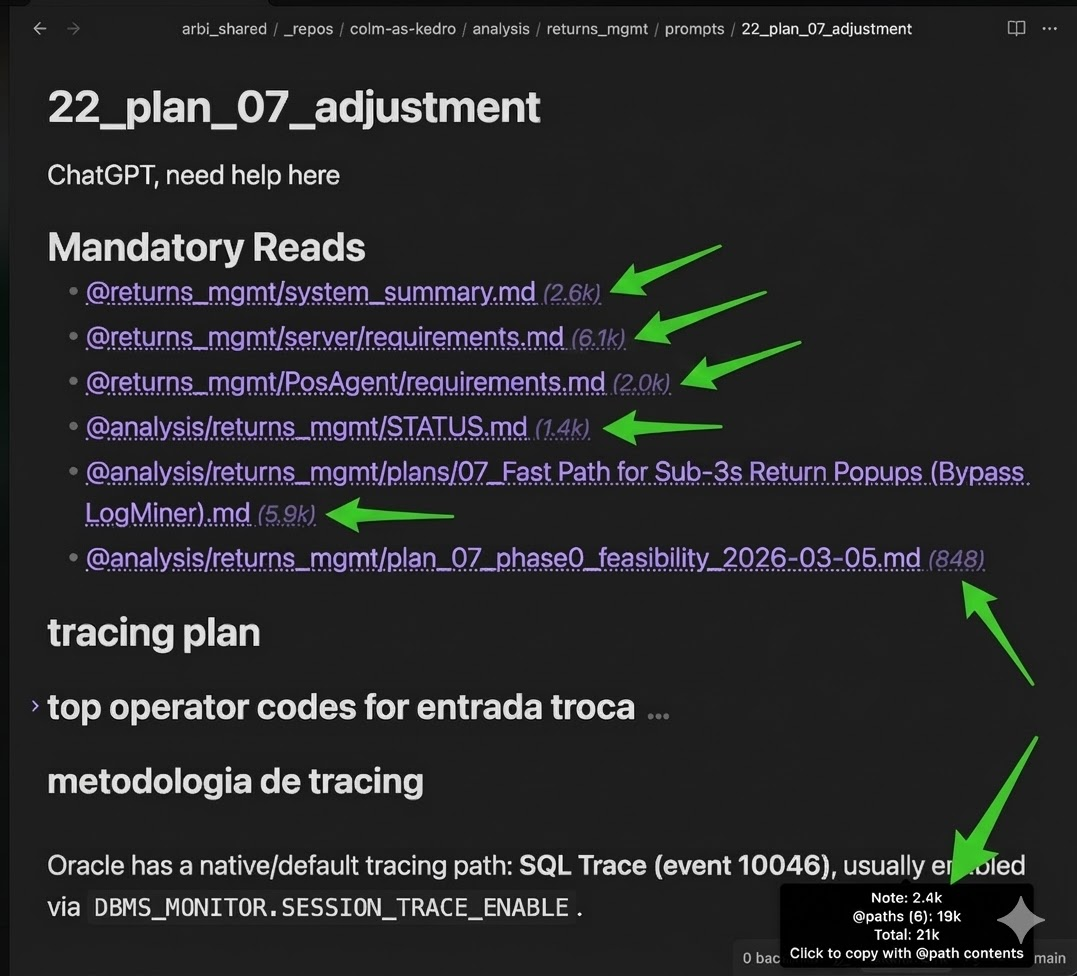 @path references rendered as clickable links with token counts